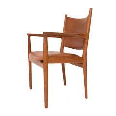 #1077 Set of 8 Hans Wegner Arm Chairs in Leather
