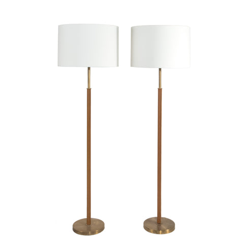 #146 Pair of leather and brass Floor lamps